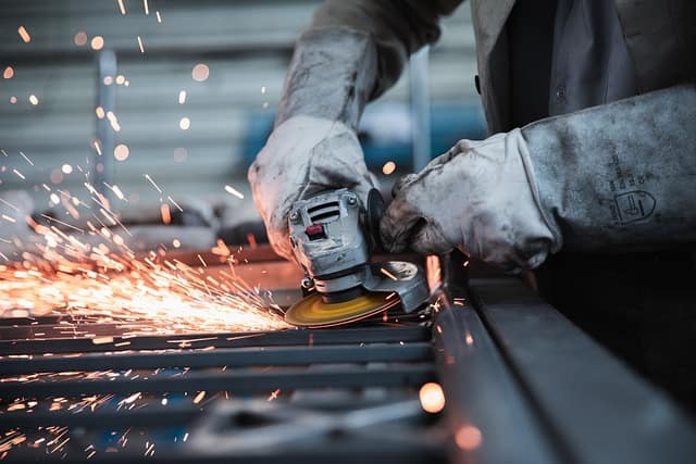 UK Manufacturing Growth Slows as Hiring Reaches Two-Year High